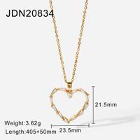 Neue Vergoldete Hohle Herzförmige Halskette Damen Edelstahl Dreieck Zirkon Halskette sku image 1