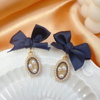 Retro Fabric Bowknot Pearl Temperament Cold Wind Stud Earrings main image 3