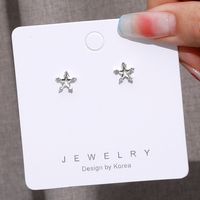 Exquisite Silver Hollow Star Earrings Wholesale sku image 1