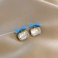 S925 Silbernadel Mode Bogen Ohrringe Nischenlegierung Diamant Ohrringe Großhandel main image 3