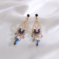 Autumn And Winter Retro Simple Long Section Hollow Flower Women's Earrings main image 3