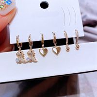 Cute Zircon Small Dinosaur Shell Heart Copper Ear Buckle Set main image 1