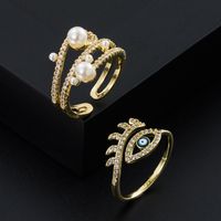 European And American Fashion Copper-plated Gold-plated Micro-inlaid Zircon Eyes Pearl Ring main image 1