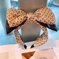 European And American Style Retro ~ Korean Plaid Brown With Plaid Geometric Dongdaemun Dot Foreign Trade Bow Headband For Women main image 6