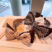 European And American Style Retro ~ Korean Plaid Brown With Plaid Geometric Dongdaemun Dot Foreign Trade Bow Headband For Women main image 3