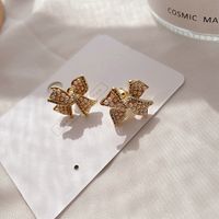 Micro-inlaid Pearl Golden Bow Fashion Earrings main image 5