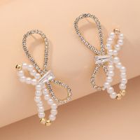 Boucles D&#39;oreilles Rétro Avec Nœud De Perles Et Diamants main image 2