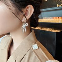 Diamond-studded Pearl Bow Retro Earrings main image 3