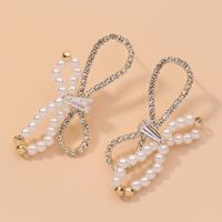 Diamond-studded Pearl Bow Retro Earrings sku image 1