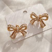 Micro-inlaid Pearl Bow Earrings sku image 1