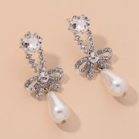 Diamond-studded Pearl Bowknot Earrings sku image 1