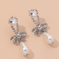 Diamond-studded Pearl Bowknot Earrings main image 1