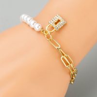 Korean Simple Alloy Inlaid Pearls Lock Multi-layer Bracelet main image 1