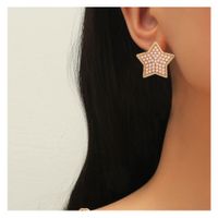 Alloy Inlaid Pearl Five-pointed Star Earrings main image 1