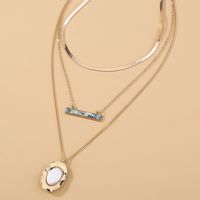 Collier Multicouche Ovale Blanc Pur main image 2