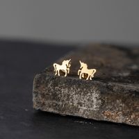 Simple Style Unicorn Alloy No Inlaid Earrings Ear Studs main image 1