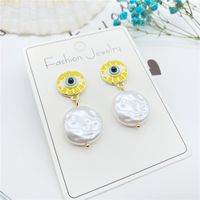 Fashion Eye Totem Pearl Earrings Wholesale sku image 1