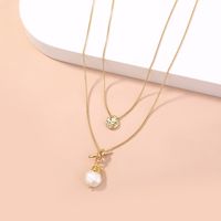 Fashion Small Golden Bean Double Knotted Pearl Necklace main image 2