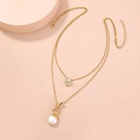 Fashion Small Golden Bean Double Knotted Pearl Necklace main image 3