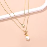 Fashion Small Golden Bean Double Knotted Pearl Necklace main image 4