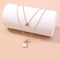 Fashion Small Golden Bean Double Knotted Pearl Necklace main image 5
