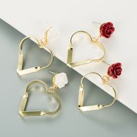 Korean Hollow Heart-shape Rose Earrings Wholesale main image 1
