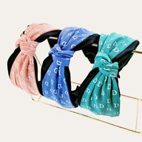 Korean Letter Contrast Color Knotted Headband main image 1