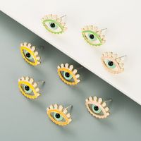 Fashion Devil's Eye Shape Dripping Color Stud Earrings main image 1