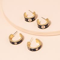 Fashion Small Daisy Geometric C-shaped Alloy Earrings Wholesale main image 1