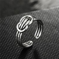 Fashion Geometric Bow Smooth Hollow Metal Ring sku image 1