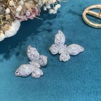 Fashion White Butterfly Copper Zircon Earrings Wholesale main image 3