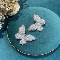 Fashion White Butterfly Copper Zircon Earrings Wholesale main image 5