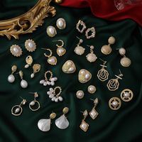 Mode Herzförmige Perlenlegierung Ohrringe Großhandel main image 3