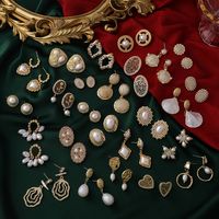 Mode Herzförmige Perlenlegierung Ohrringe Großhandel main image 5