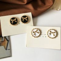 S925 Silver Needle French Retro Button Bow Earrings main image 1