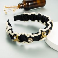 Korean New Fold Pearl Wide-brimmed Diamond-studded Bow Headband sku image 1