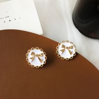 S925 Silver Needle French Retro Button Bow Earrings sku image 1