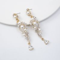 Boucles D&#39;oreilles Coréennes En Perles De Fleurs Cloutées De Diamants En Gros main image 1