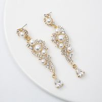 Boucles D&#39;oreilles Coréennes En Perles De Fleurs Cloutées De Diamants En Gros main image 4