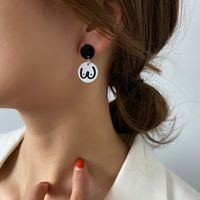 Simple Black And White Round Alloy Earrings Wholesale main image 1