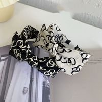 Korean Black And White Bow-knot Wide-brimmed Headband main image 4