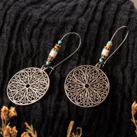 Retro Old Hollow Round Flower Alloy Long Earrings main image 3