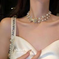 Korean Double-layer Bowknot Pearl Necklace Wholesale main image 1