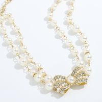 Korean Double-layer Bowknot Pearl Necklace Wholesale main image 5