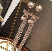 Fashion Pearl Bowknot Long Tassel Earrings main image 3