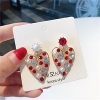 Fashion Pearl Rhinestone Hollow Heart-shape Alloy Earrings Wholesale main image 4