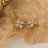 Korean Heart-shape Four-petal Flower Alloy Earrings Wholesale main image 1