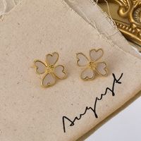 Korean Heart-shape Four-petal Flower Alloy Earrings Wholesale main image 4