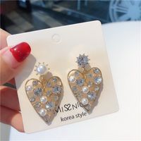 Fashion Pearl Rhinestone Hollow Heart-shape Alloy Earrings Wholesale sku image 1