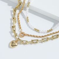 Collier En Alliage Multicouche En Forme De Coeur Avec Perles Géométriques En Gros main image 3
